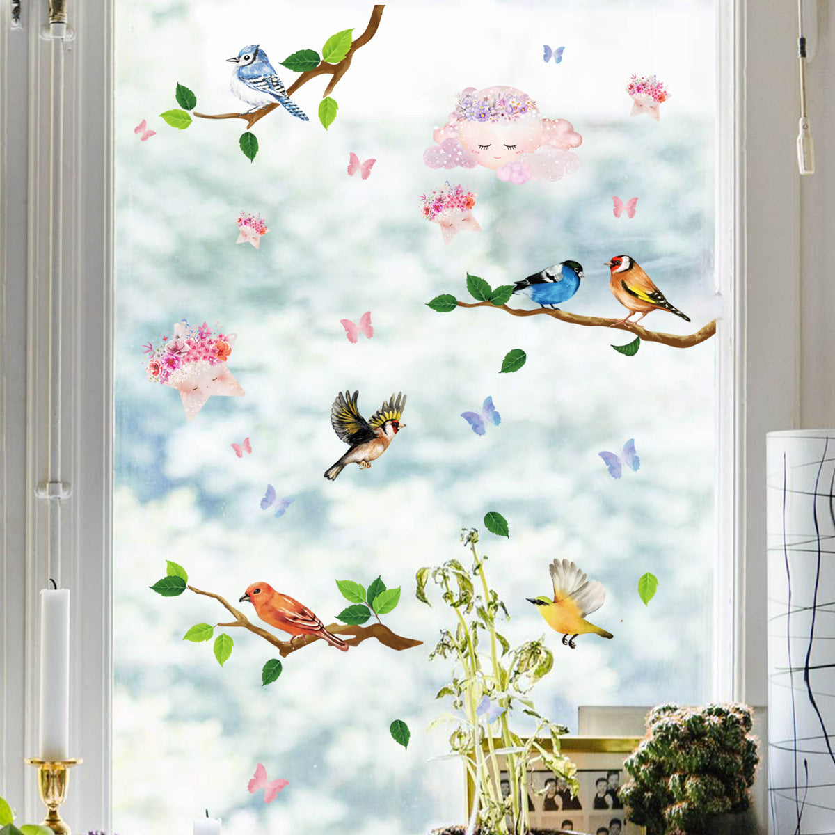 Zelfklevend raamsticker vogels op tak met wolken en sterren