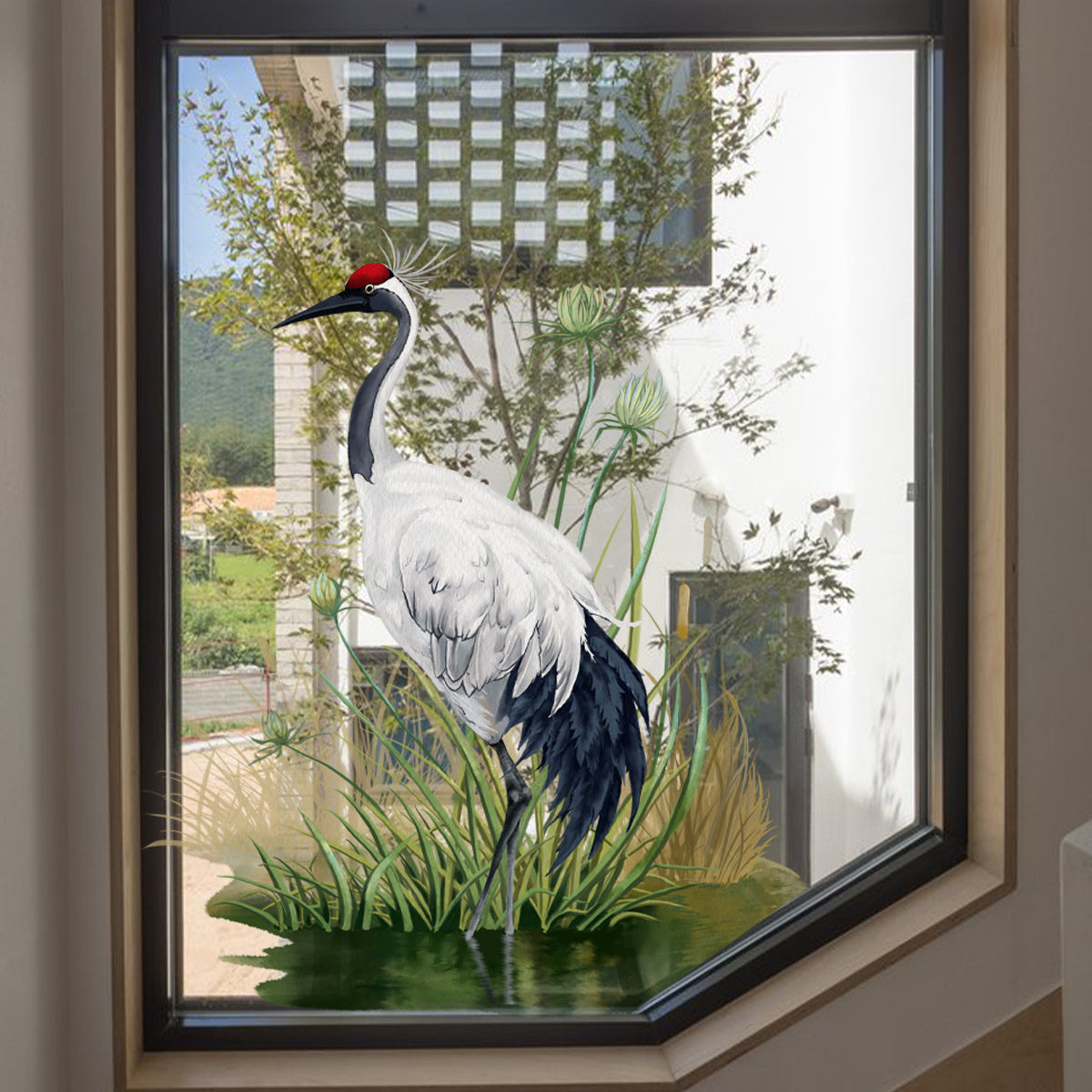 Statische raamsticker kraanvogel in de vijver